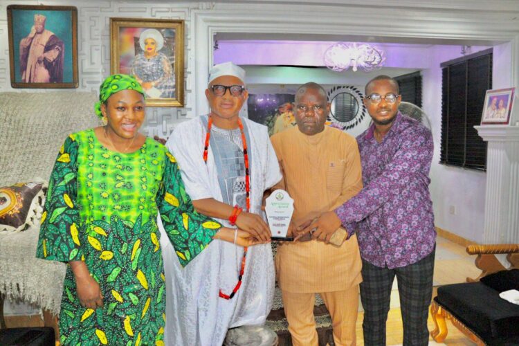 Majeolate, High Chief Oyekanmi Hassan Presents Appreciation Award to NPC Over Donation of Computers.