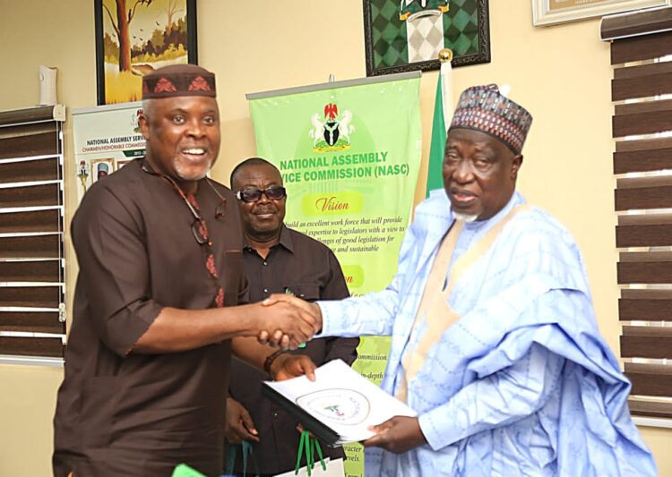 YOU ARE A ROUND PEG IN A ROUND HOLE, NASC BOSS TELLS NASS LIBRARY TRUST FUND EXECUTIVE SECRETARY