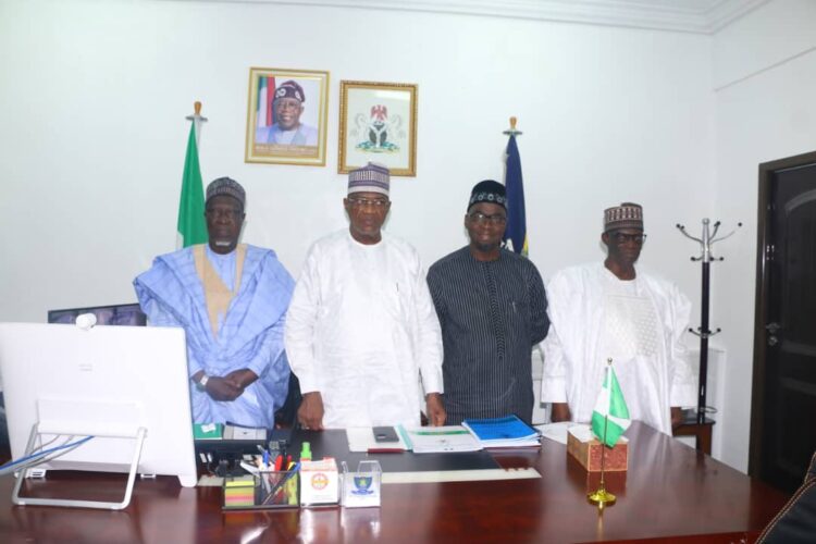 Picture  News. NASC Chairman, Ahmed Kadi Amshi Congratulates Minister for police affairs, Senator Dr Ibrahim Geidam in his office at the federal secretariat on Friday.