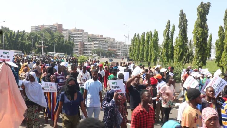 Protest: APC youth wing, Nigerians March in thousands against Kyari Over failure of NNPCL to fix local refineries
