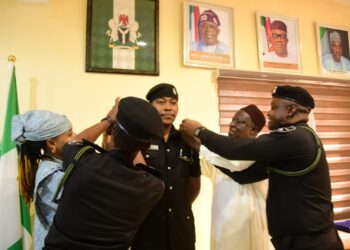 NASC Chairman Decorates Newly Promoted Ifeanyi Nwoye in charge of National Assembly Service Commission.